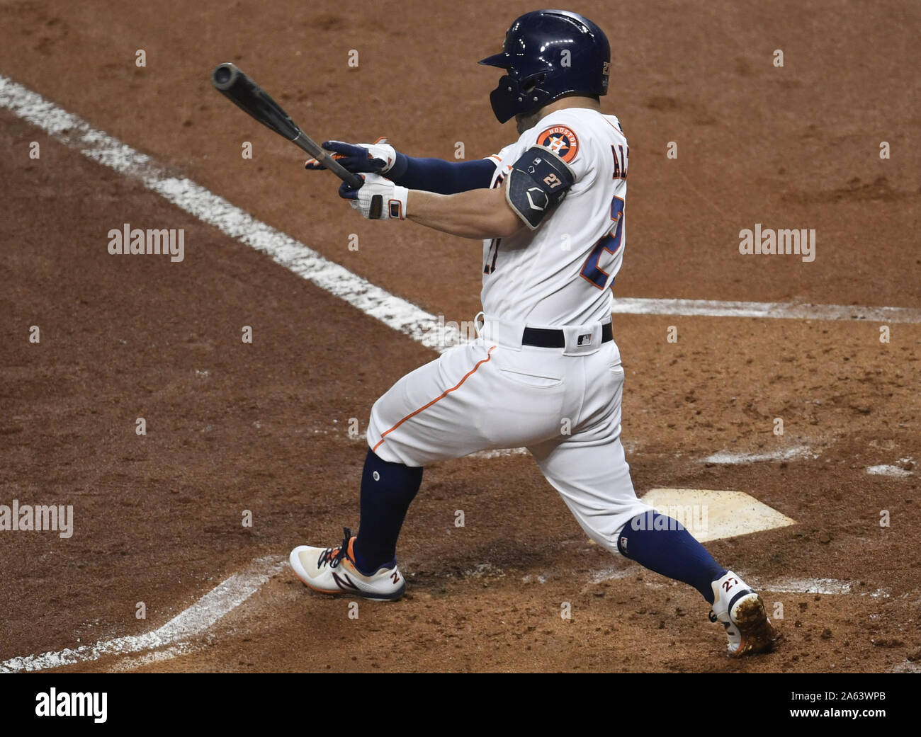 Houston, United States. 23rd Oct, 2019. Houston Astros Jose Altuve hits a double against the Washington Nationals in the first inning of Game 2 of the World Series at Minute Maid Park in Houston, Texas on Wednesday, October 23, 2019. The Nationals lead the best-of-seven series 1-0. Photo by Trask Smith/UPI Credit: UPI/Alamy Live News Stock Photo