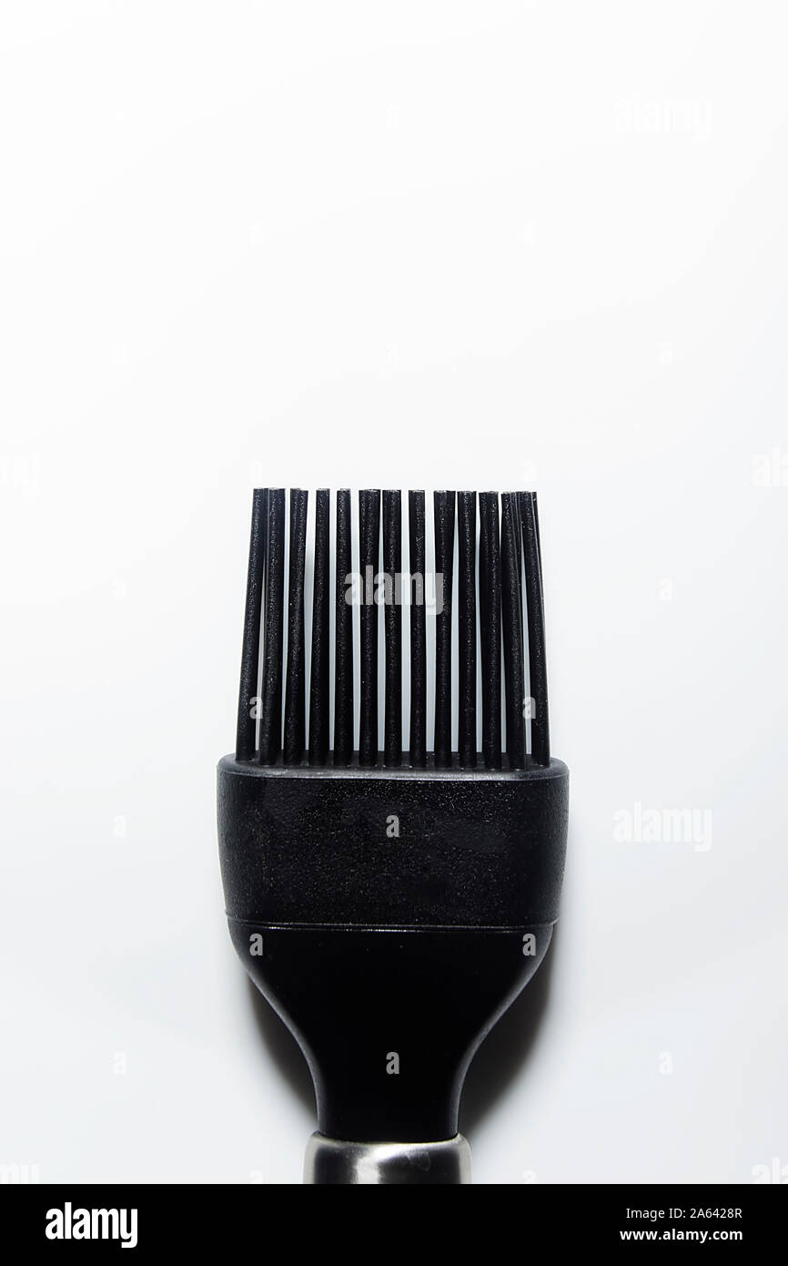 Black kitchen silicone brush on a white background Stock Photo