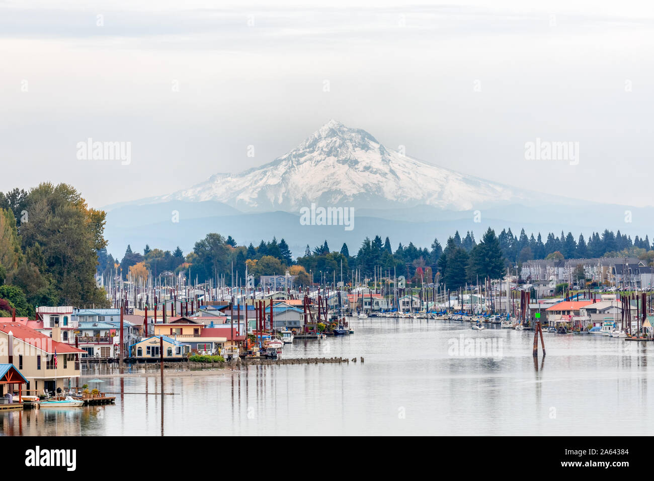 View of Mt. Hood and Portland Marina floating boat houses in Oregon, USA Stock Photo