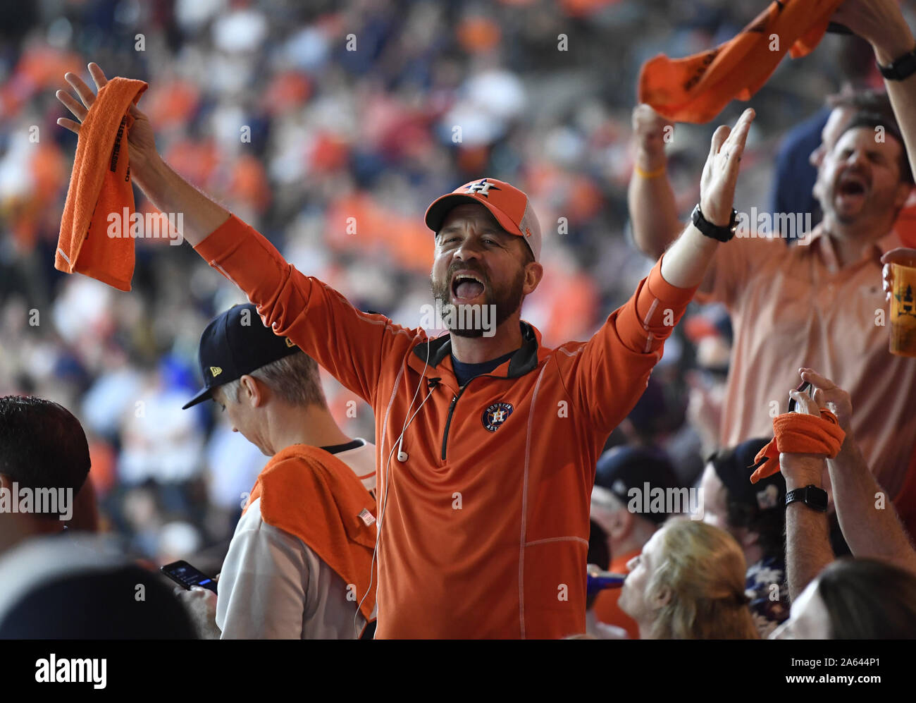Houston, United States. 23rd Oct, 2019. Houston Astros fans shout in the sixth inning of Game 2 of the World Series against the Washington Nationals at Minute Maid Park in Houston, Texas on Wednesday, October 23, 2019. The Nationals lead the best-of-seven series 1-0. Photo by Trask Smith/UPI Credit: UPI/Alamy Live News Stock Photo