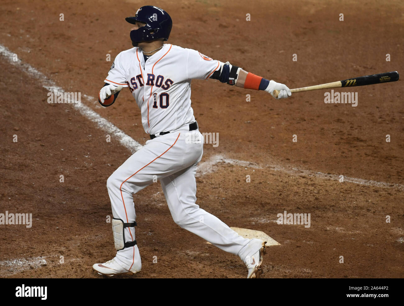 Houston, United States. 23rd Oct, 2019. Houston Astros Yuli Gurriel hits a double against the Washington Nationals in the sixth inning of Game 2 of the World Series at Minute Maid Park in Houston, Texas on Wednesday, October 23, 2019. The Nationals lead the best-of-seven series 1-0. Photo by Trask Smith/UPI Credit: UPI/Alamy Live News Stock Photo