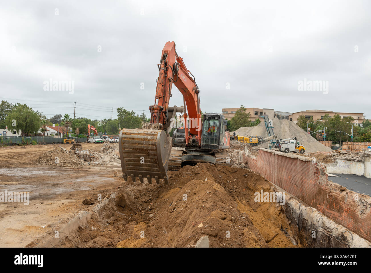 Hitachi excavator digging at construction site, Old Town, San Diego, California Stock Photo