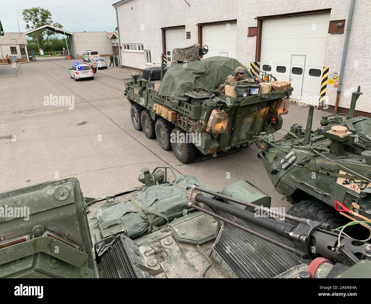 U.S. Soldiers from the Comanche Troop, 1st Squadron, 2d Cavalry Regiment, stop to refuel in Podivín, Czech Republic, during Saber Guardian 2019. SG19 involved a tactical road march from Rose Barracks, Germany to Cincu, Romania. (U.S. Army photo by 1st Lt. Billy Anse Lacroix) Stock Photo