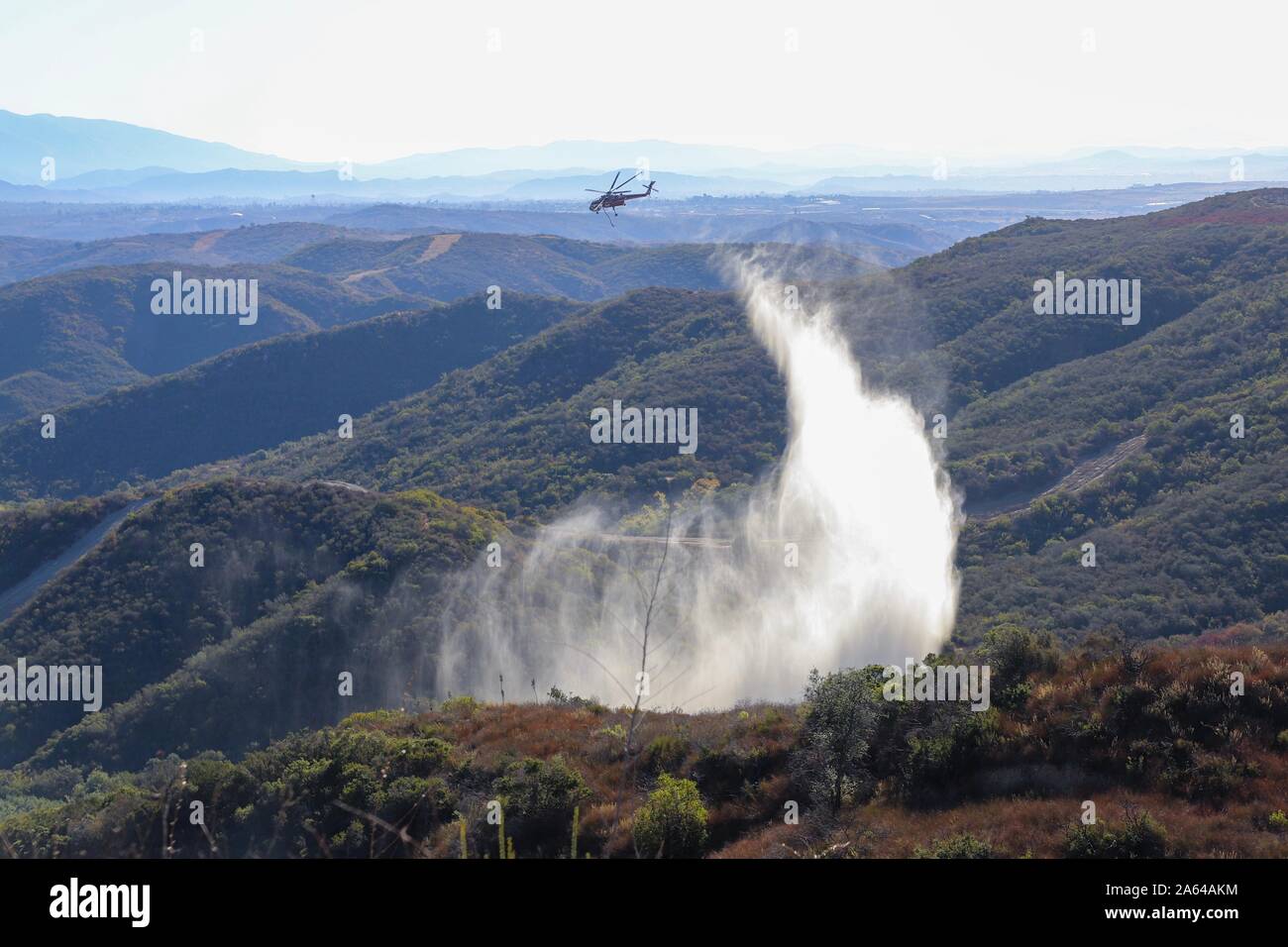 A type 2 aircraft extinguishes hot spots at Range 409A on Marine Corps ...