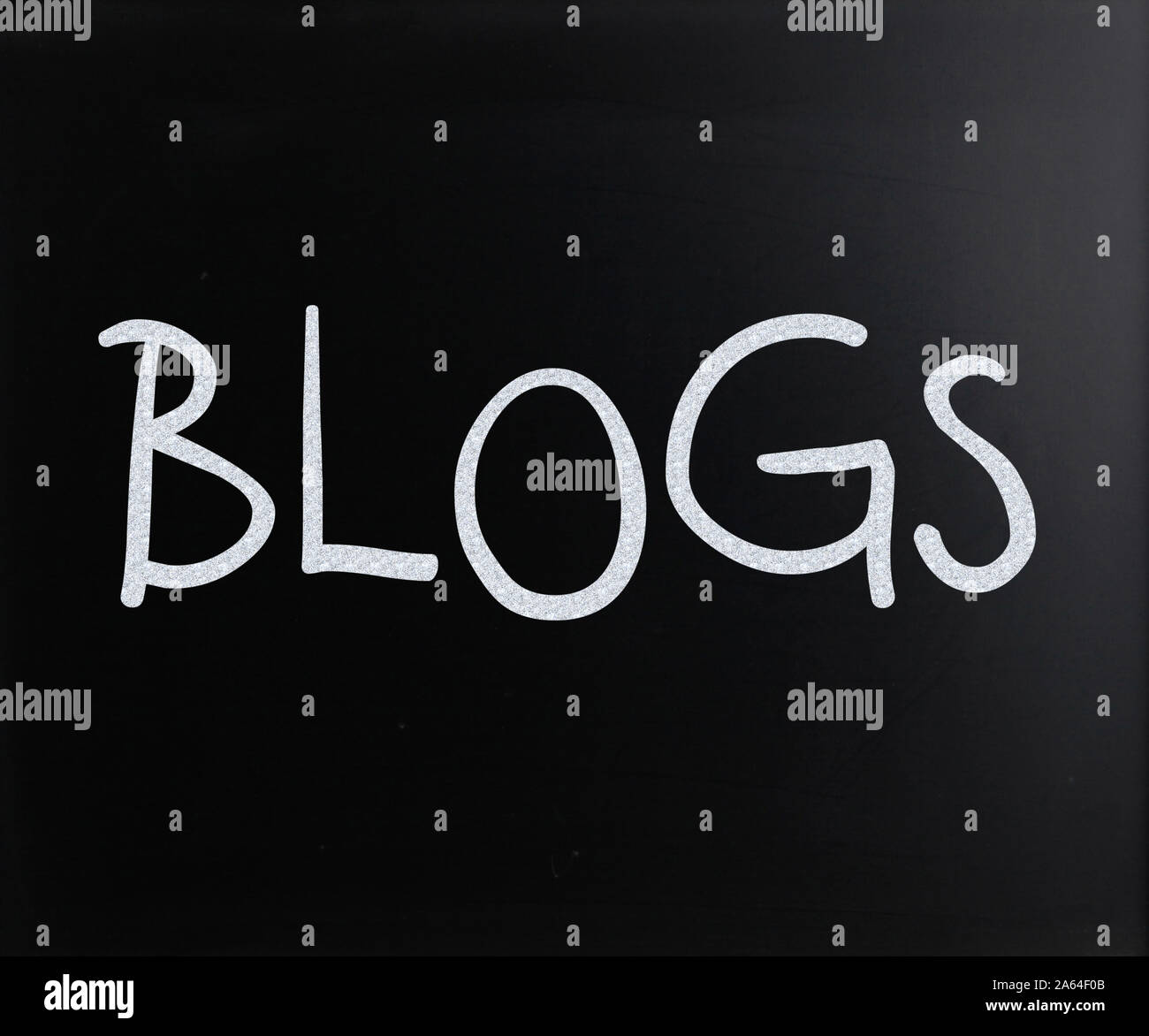 "Blogs" handwritten with white chalk on a blackboard Stock Photo Alamy