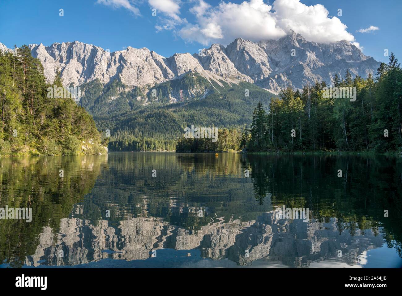 Eibsee lake below the Zugspitze in the Wetterstein range in Grainau ...