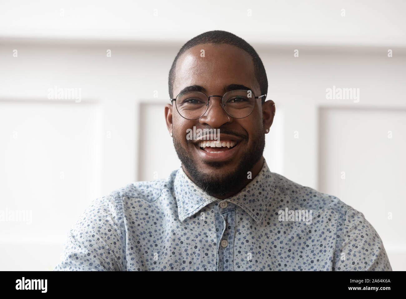 Portrait of smiling black man looking at camera Stock Photo