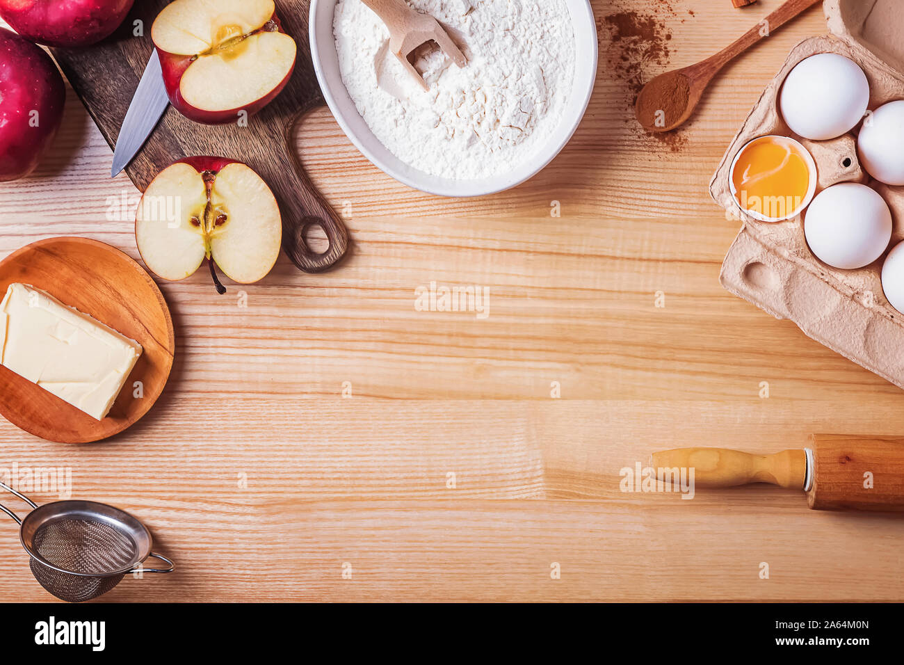 Ingredients for making apple pie on wooden table Stock Photo
