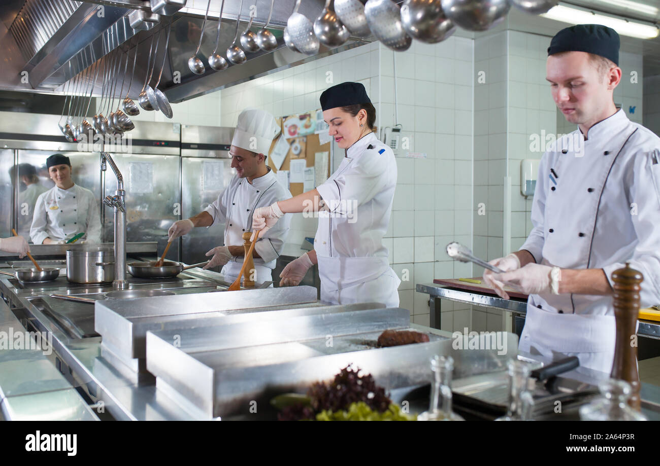 Work About Cook the work of the cook in the kitchen of the restaurant Stock Photo - Alamy
