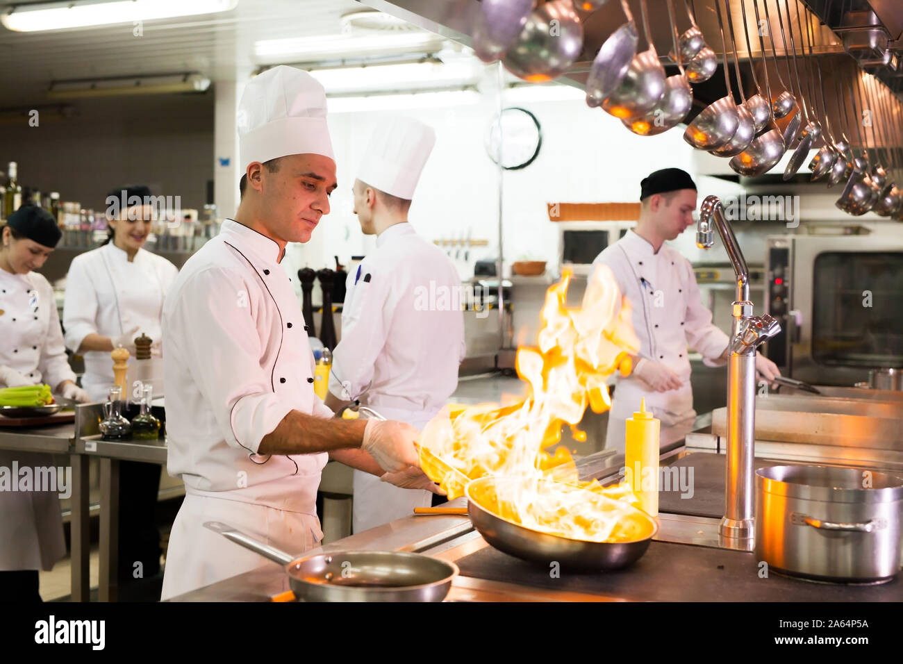 the work of the cook in the kitchen of the restaurant Stock Photo - Alamy