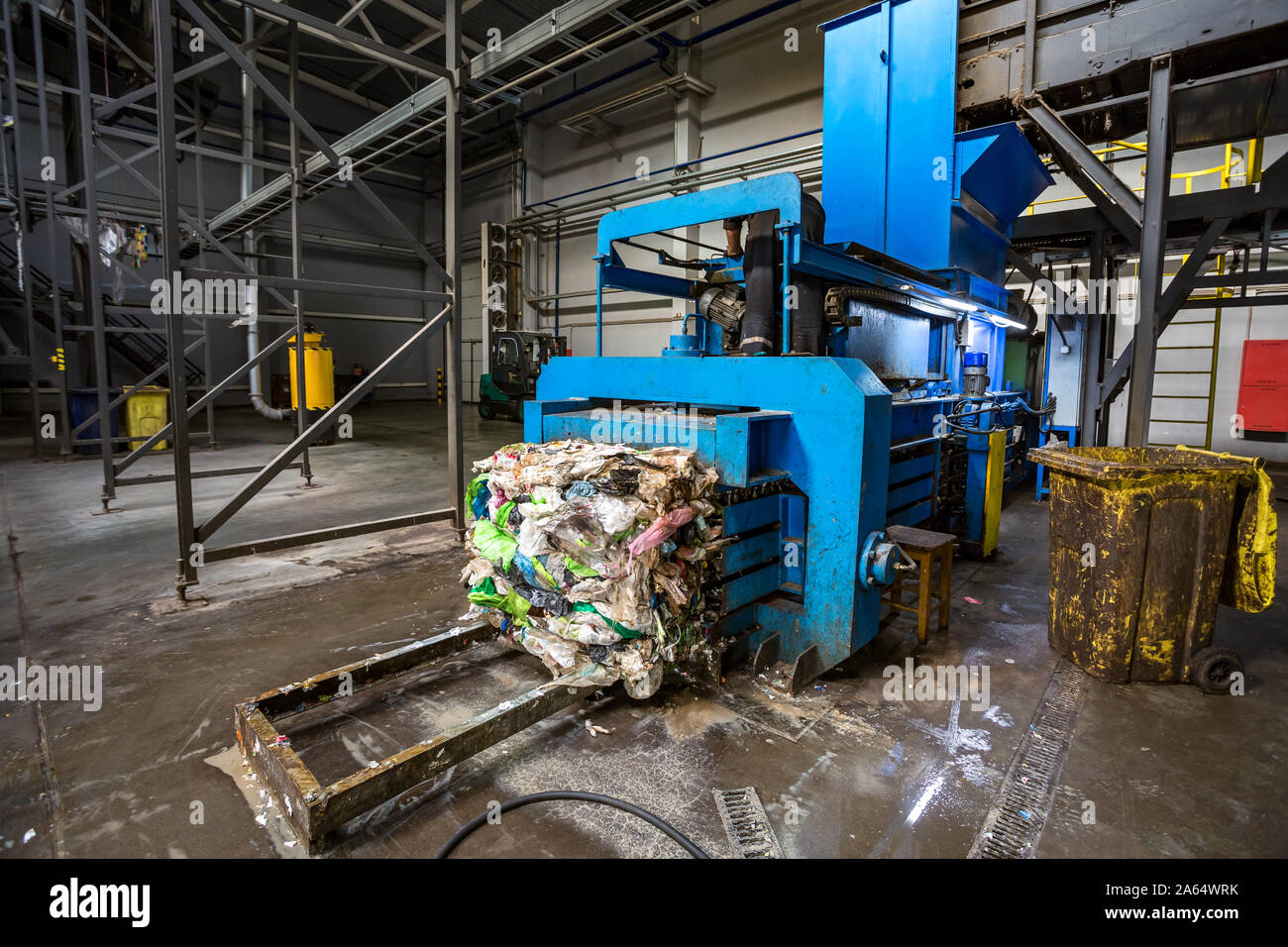 Equipment for pressing debris sorting material to be processed in