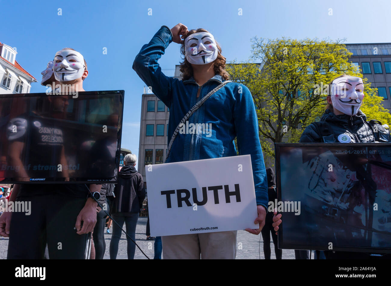 Anonymous hacktivist group. People with Vendetta mask demonstrating on ...