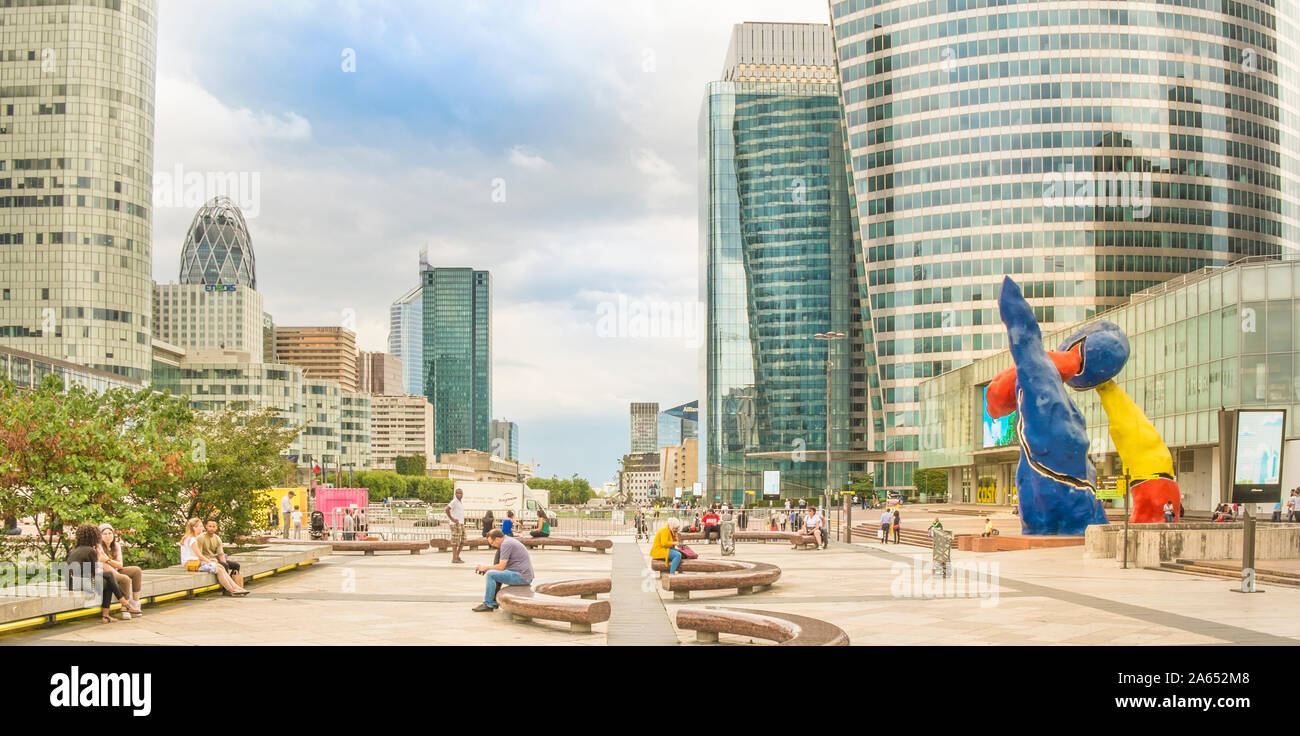 people relaxing on the promenade of la defense Stock Photo