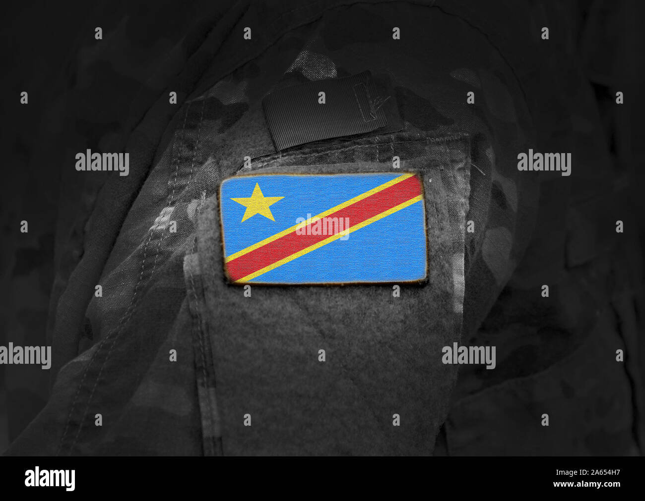 Flag of Democratic Republic of the Congo on military uniform. Army, troops, soldiers, Africa,(collage). Stock Photo