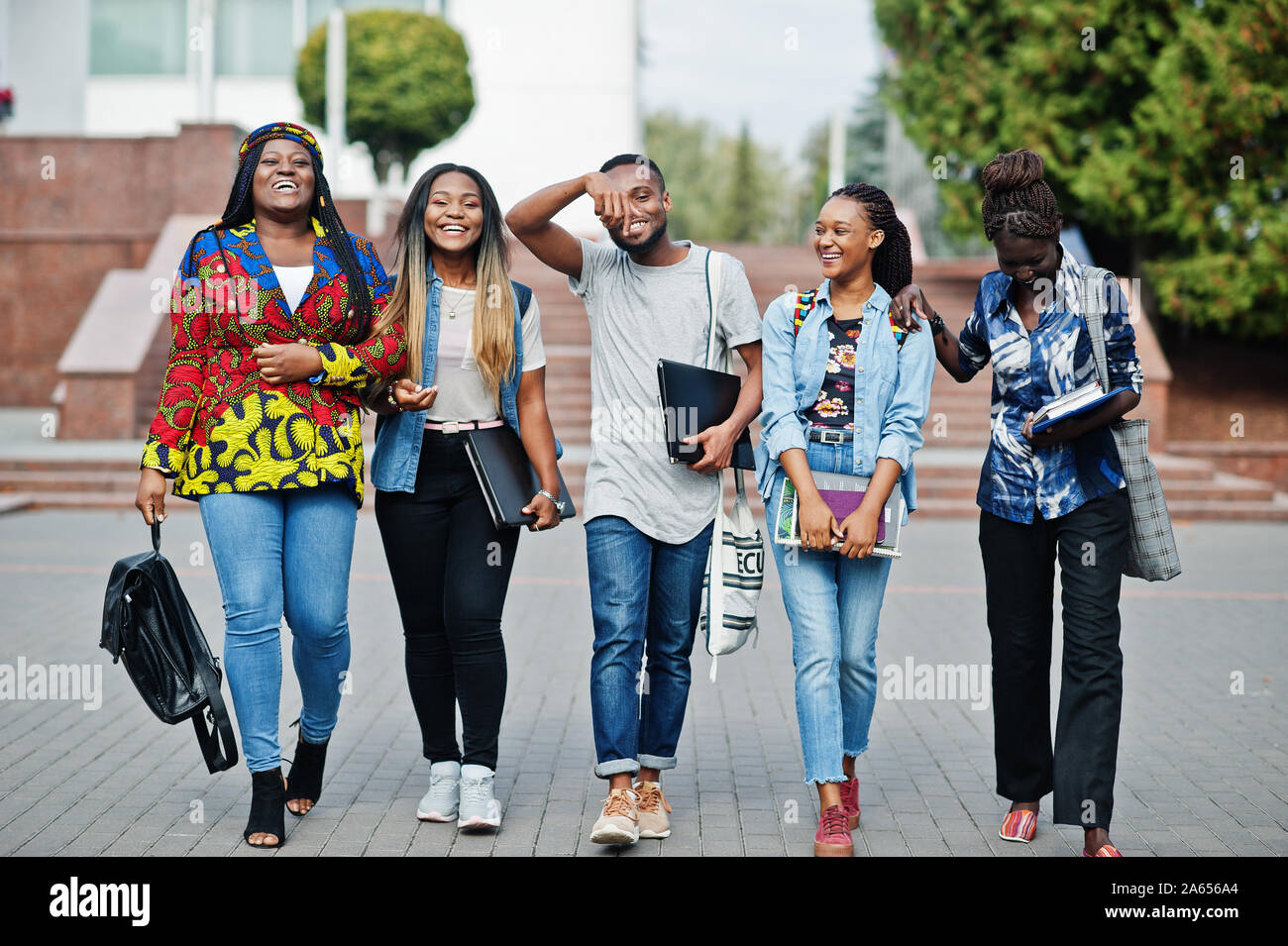 Group Of Five African College Students Spending Time Together On Campus ...