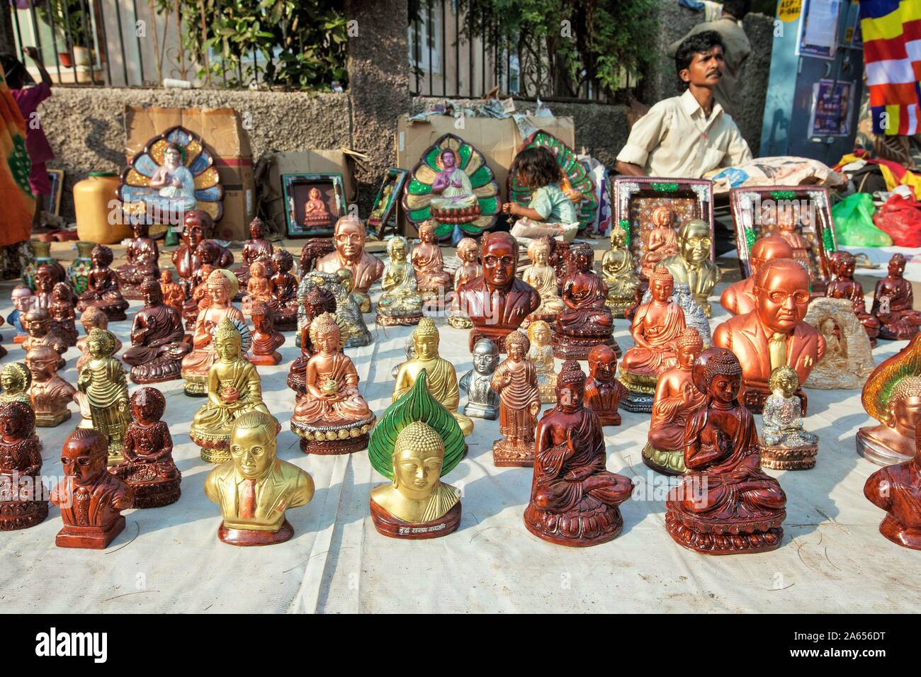 Hawker selling statues of Dr Babasaheb Ambedkar and Gautam Buddha