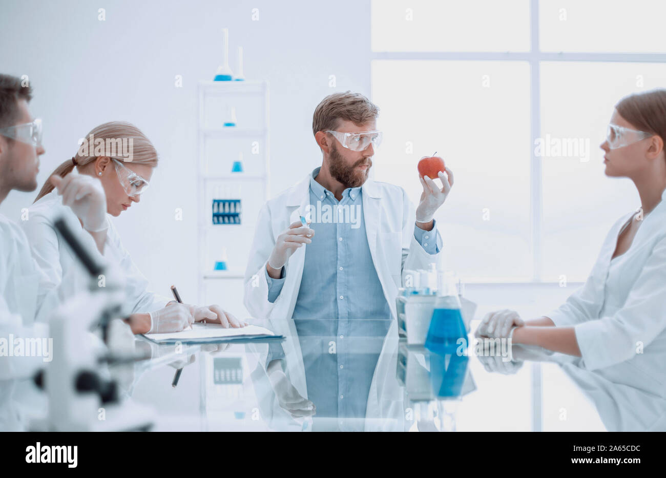 scientific expert checking the quality of fruits Stock Photo Alamy