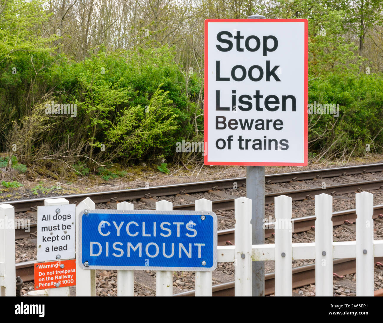 Country railway Level crossing warning stop signs. UK Stock Photo