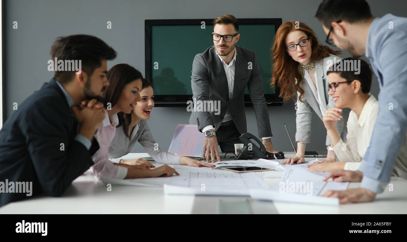 Group of architects working on project Stock Photo