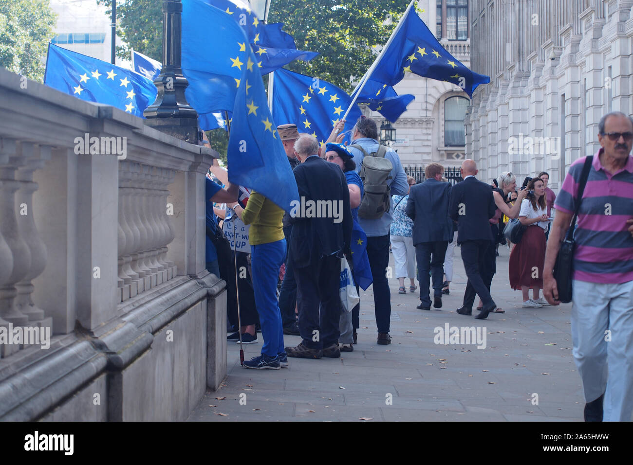 A view of people protesting over Brexit on Whitehall, Westminster, London, waving EU flags Stock Photo