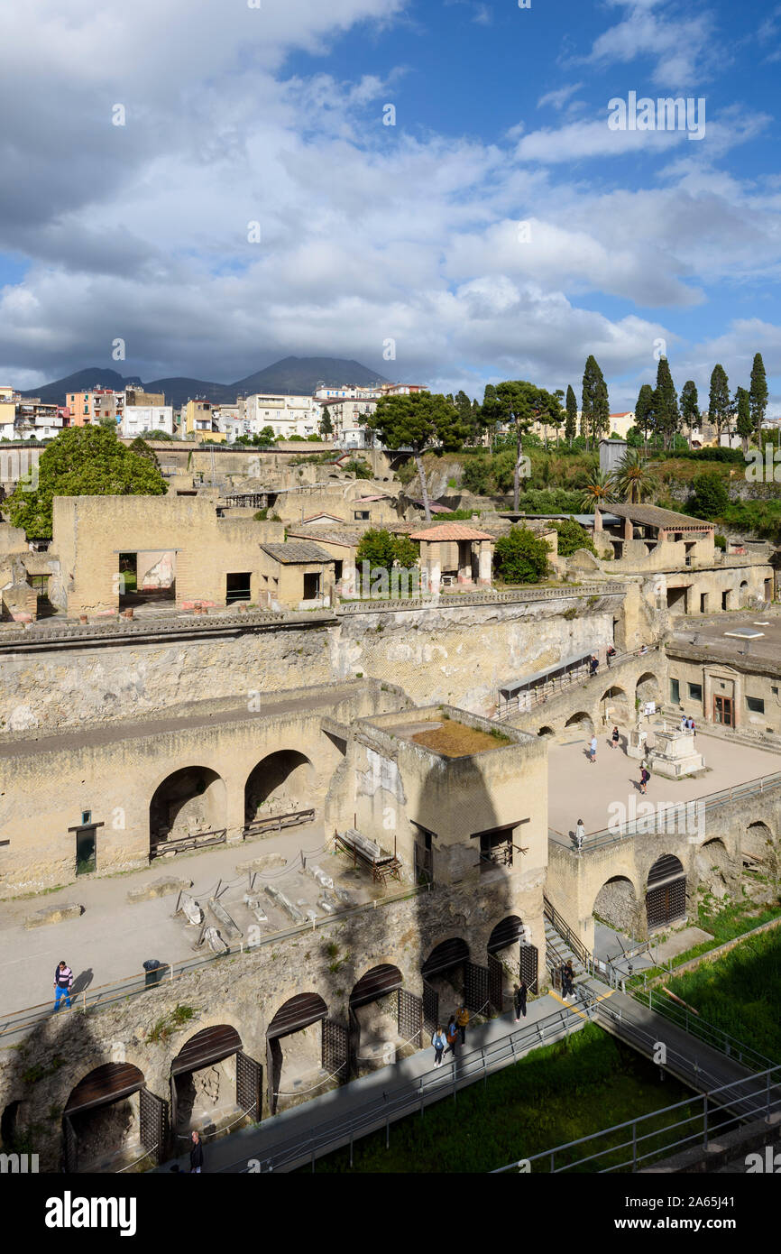 Ercolano. Italy. View of the archaeological site of Herculaneum with the ancient shoreline in foreground, Mount Vesuvius can be seen in the background Stock Photo