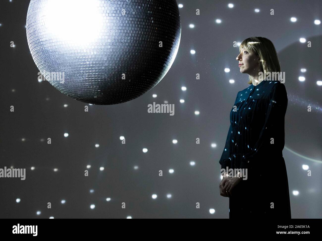 Edinburgh, United Kingdom. 24 October, 2019 Pictured: Katie Paterson with her 2016 work Totality at the Humanity, Time and the Cosmos press call. Humanity, Time and the Cosmos is the sixth and final instalment of the ground-breaking NOW Series at the Scottish National Gallery of Modern Art. It includes the first major showing in Scotland of Scottish artist, Katie Paterson, whose works are made possible through extensive collaborations with scientists, specialists, writers and others in the forefront of their fields. Credit: Rich Dyson/Alamy Live News Stock Photo