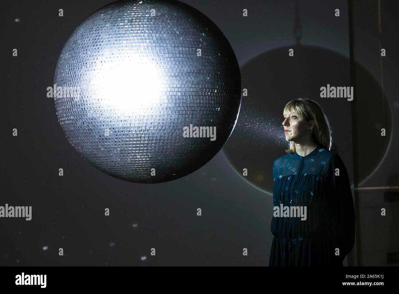 Edinburgh, United Kingdom. 24 October, 2019 Pictured: Katie Paterson with her 2016 work Totality at the Humanity, Time and the Cosmos press call. Humanity, Time and the Cosmos is the sixth and final instalment of the ground-breaking NOW Series at the Scottish National Gallery of Modern Art. It includes the first major showing in Scotland of Scottish artist, Katie Paterson, whose works are made possible through extensive collaborations with scientists, specialists, writers and others in the forefront of their fields. Credit: Rich Dyson/Alamy Live News Stock Photo