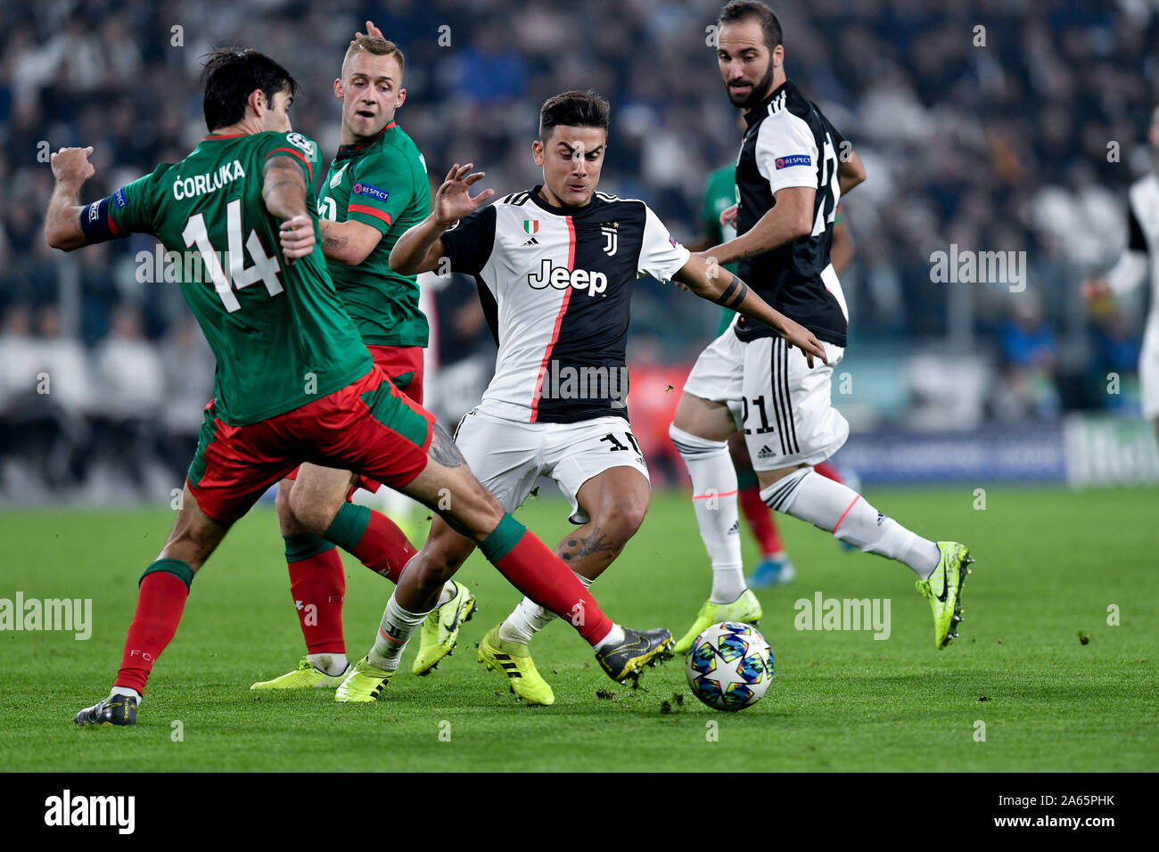Turin, Italy. 22nd Oct, 2019. Paulo Dybala of Juventus lis challenged by Vedran Corluka of Lokomotiv Moscow during the UEFA Champions League group stage match between Juventus and Lokomotiv Moscow at the Juventus Stadium, Turin, Italy on 22 October 2019. Photo by Giuseppe Maffia. Credit: UK Sports Pics Ltd/Alamy Live News Stock Photo