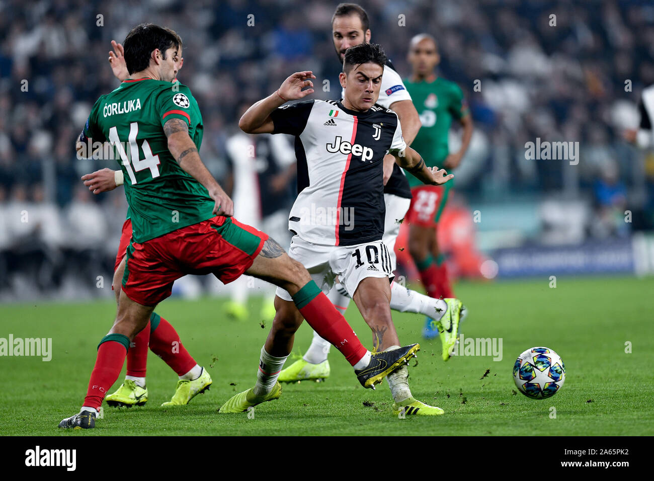 Turin, Italy. 22nd Oct, 2019. Paulo Dybala of Juventus lis challenged by Vedran Corluka of Lokomotiv Moscow during the UEFA Champions League group stage match between Juventus and Lokomotiv Moscow at the Juventus Stadium, Turin, Italy on 22 October 2019. Photo by Giuseppe Maffia. Credit: UK Sports Pics Ltd/Alamy Live News Stock Photo