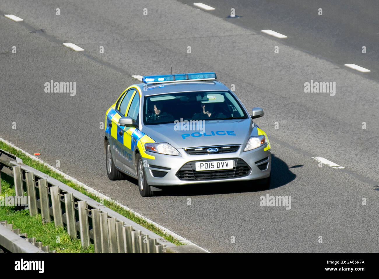 Police Ford Mondeo Edge TDCI; UK Vehicular traffic, transport, modern, saloon cars, south-bound on the 3 lane M6 motorway highway. UK Stock Photo