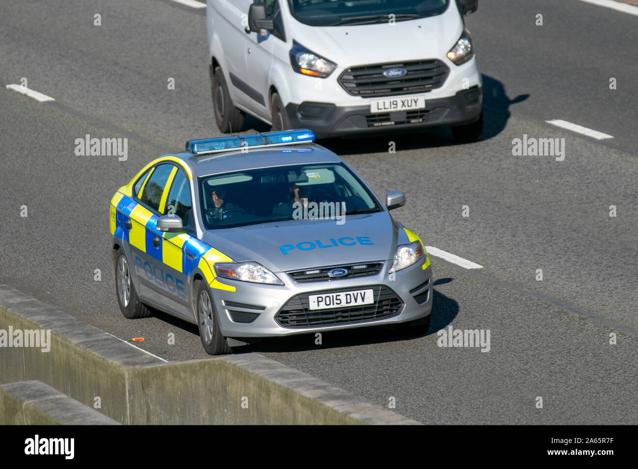 Police Ford Mondeo Edge TDCI; UK Vehicular traffic, transport, modern, saloon cars, south-bound on the 3 lane M6 motorway highway. UK Stock Photo