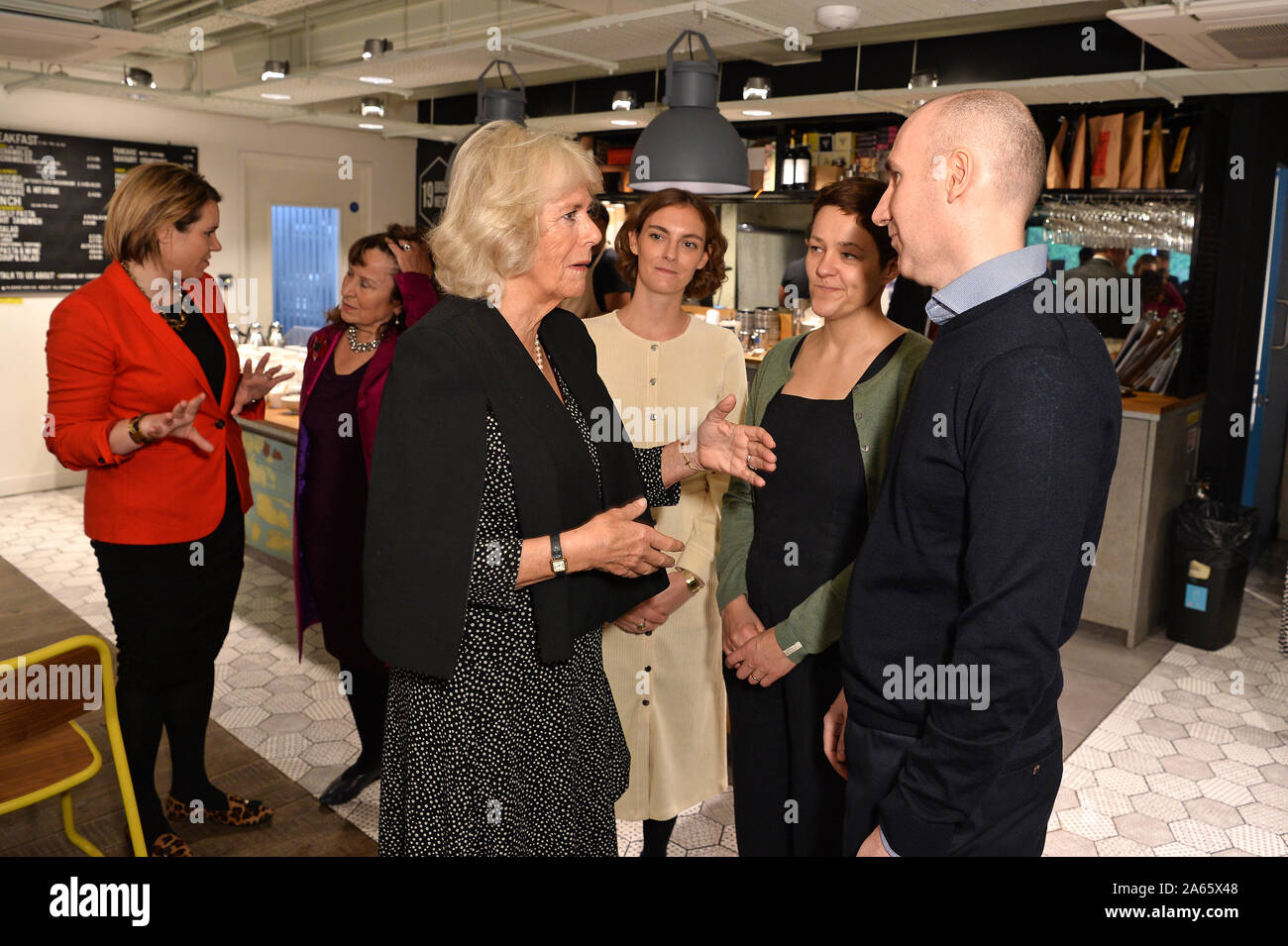 The Duchess of Cornwall meets with authors Rachel Seiffert and Stephen Kelman during a tea reception at KPMG's Mayfair Cafe to mark the 7th anniversary of the National Literacy Trust's Books Unlocked programme which provides free copies of Booker Prize shortlisted titles to people in prison library groups to read, discuss and keep. PA Photo. Picture date: Thursday October 24, 2019. See PA story ROYAL Camilla. Photo credit should read: Jeff Spicer/PA Wire Stock Photo