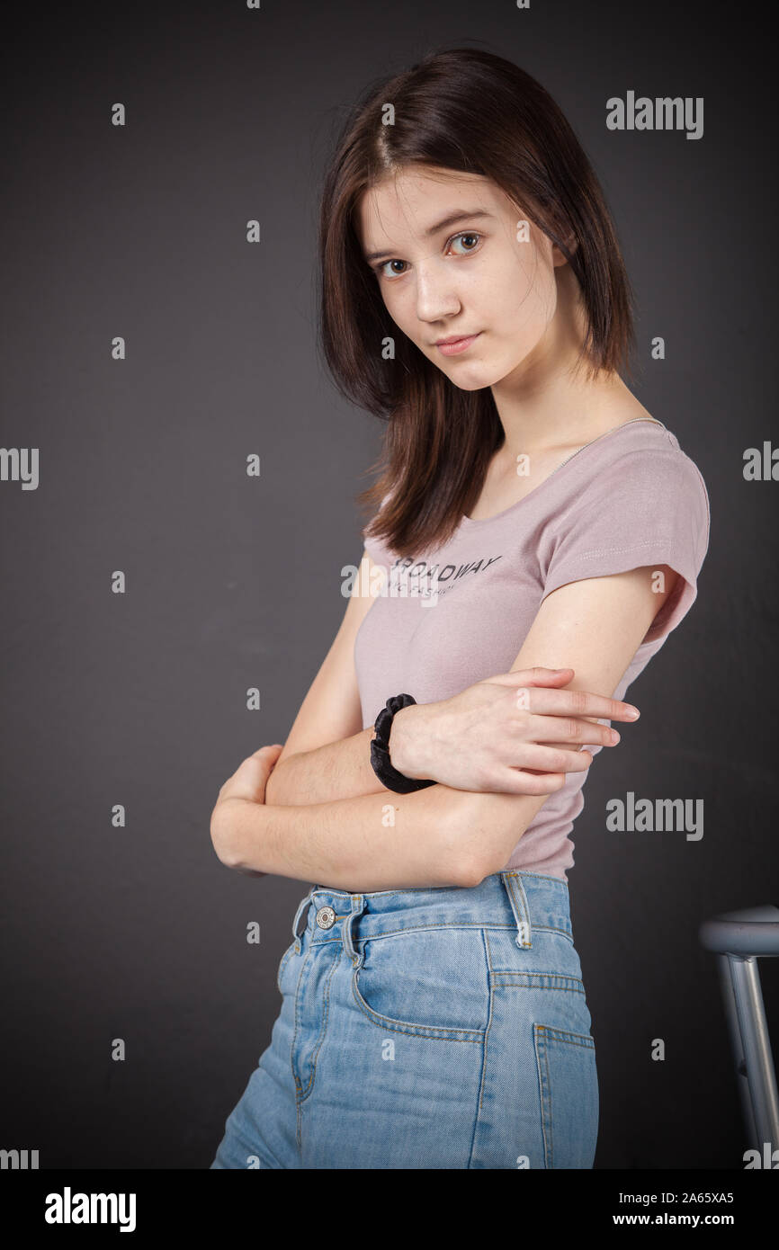 young woman, girl, photo session, various poses, different moods, smile, serious facial expressions, winks, flirts, friendship, love, relationships Stock Photo
