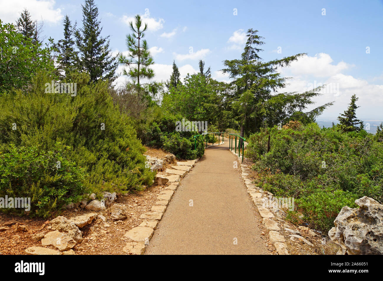 Hikers at the Keshet Cave (Arch Cave) in Adamit Park, Western Galilee