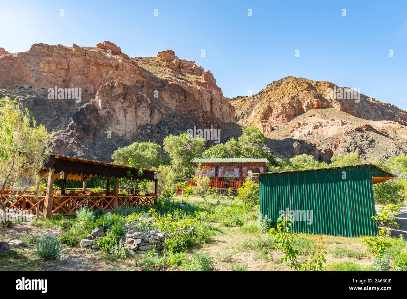 Charyn National Park Sharyn Canyon Breathtaking Picturesque View of a Bungalow Camp on a Sunny Blue Sky Day Stock Photo
