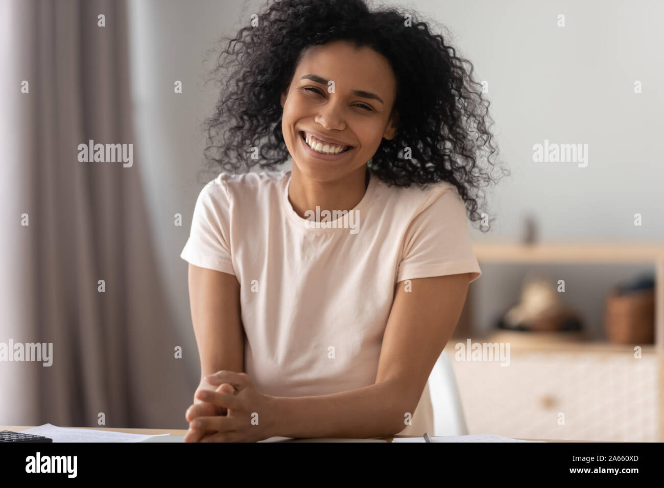 Portrait of happy african American girl posing at home Stock Photo - Alamy