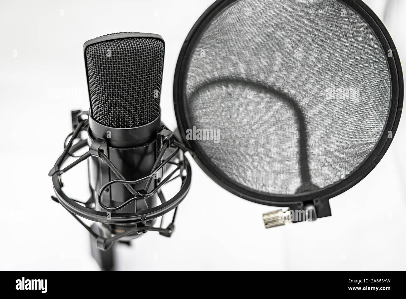 Large capsule condenser microphone with stand and antipop filter Stock Photo