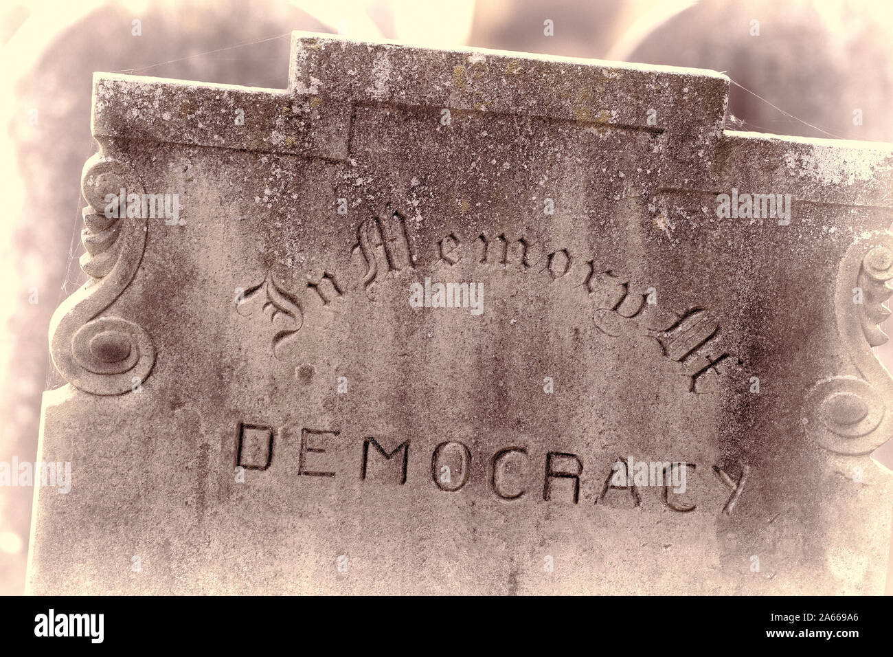In Memory of democracy. Brexit referendum and election concept image. Gravestone with the word democracy. Political madness and modern politics gone b Stock Photo