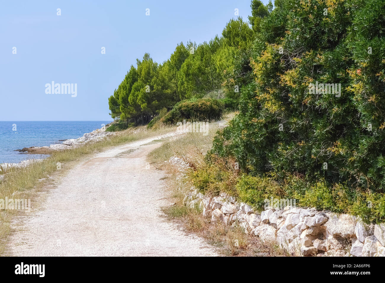 Footpath for outdoor hiking along the seashore on the Red Island in Croatia. Stock Photo