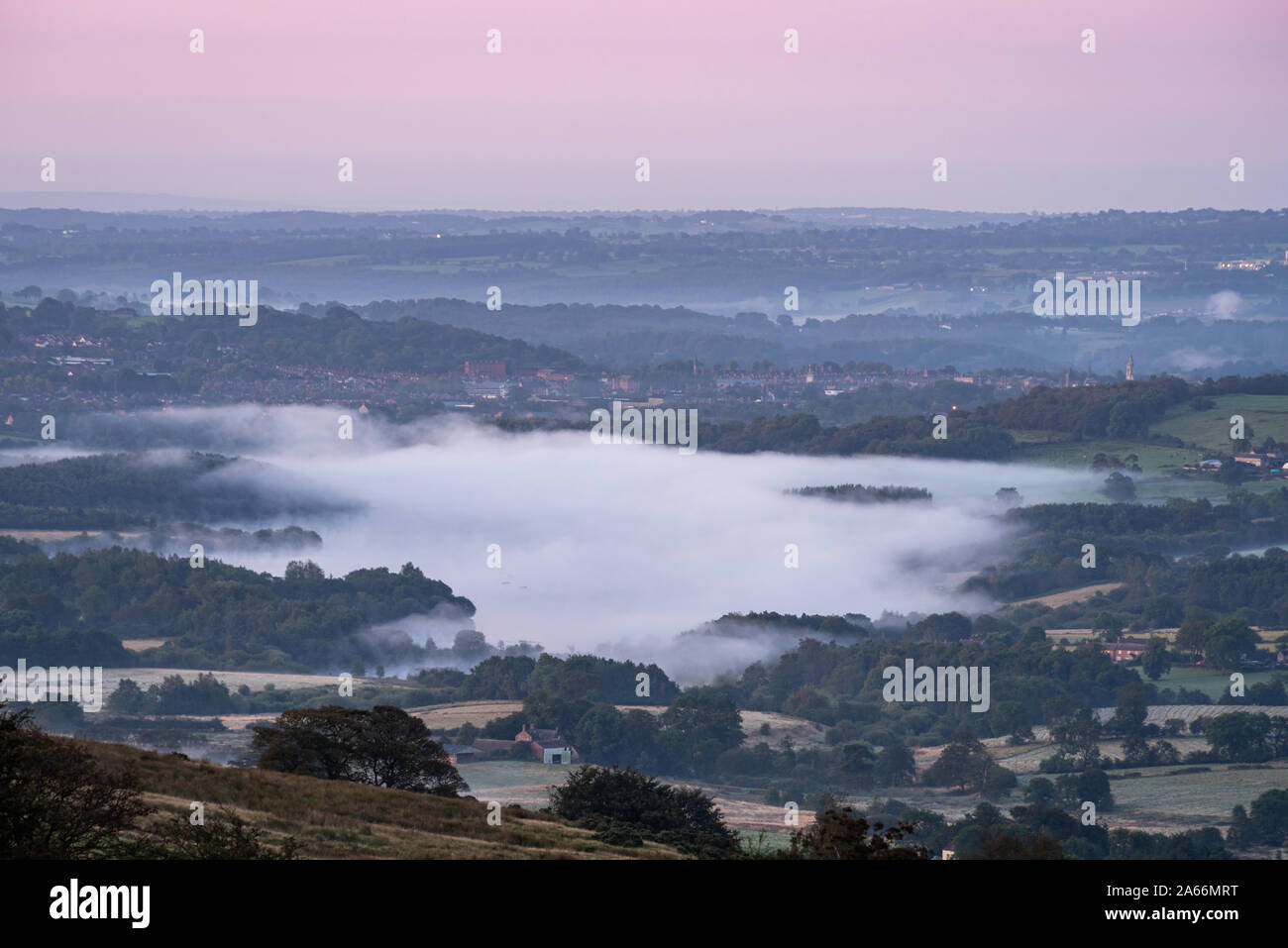 A panoramic view of Tittersworth reservoir shrouded in mist from The Roaches in the Peak District National Park, Staffordshire, UK Stock Photo