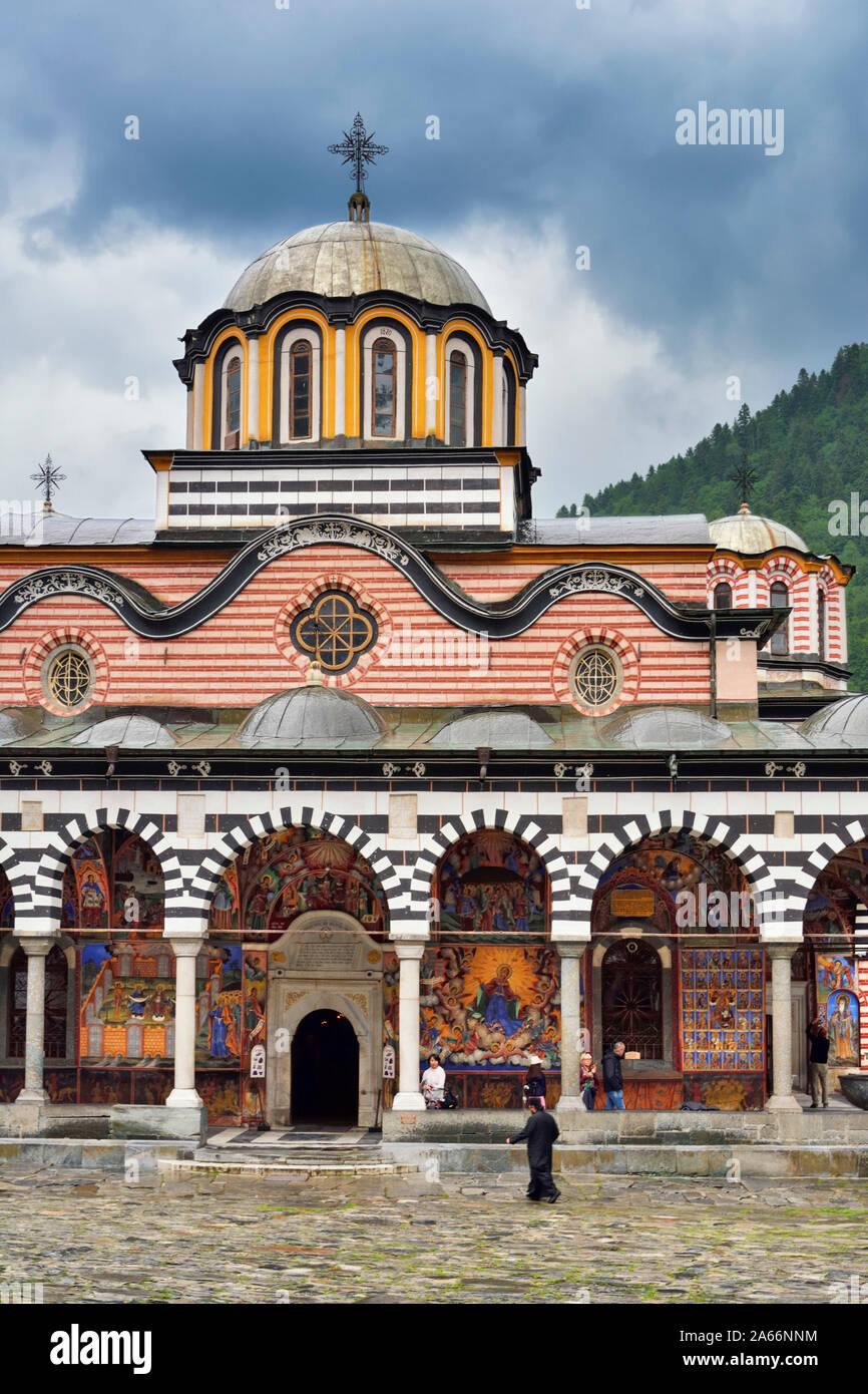 The Church of the Nativity of the Virgin Mother and the courtyard. Rila Monastery (Monastery of Saint Ivan of Rila), the largest Eastern Orthodox monastery in Bulgaria. A UNESCO World Heritage Site. Rila Mountains, Bulgaria Stock Photo
