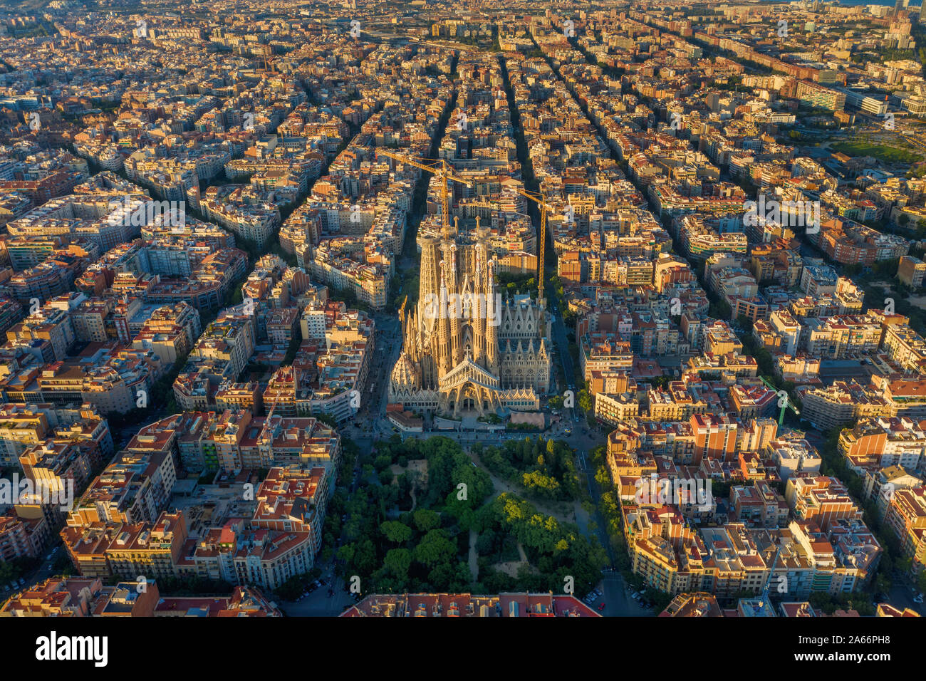 Spain, Catalunya, Barcelona, Aerial view of Eixample district and Sagrada Familia Cathedral Stock Photo