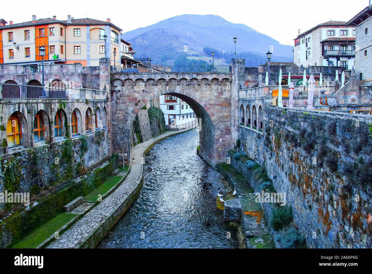 Panoramic view of old bridge in Potes, a municipality in the autonomous community of Cantabria in Spain Stock Photo