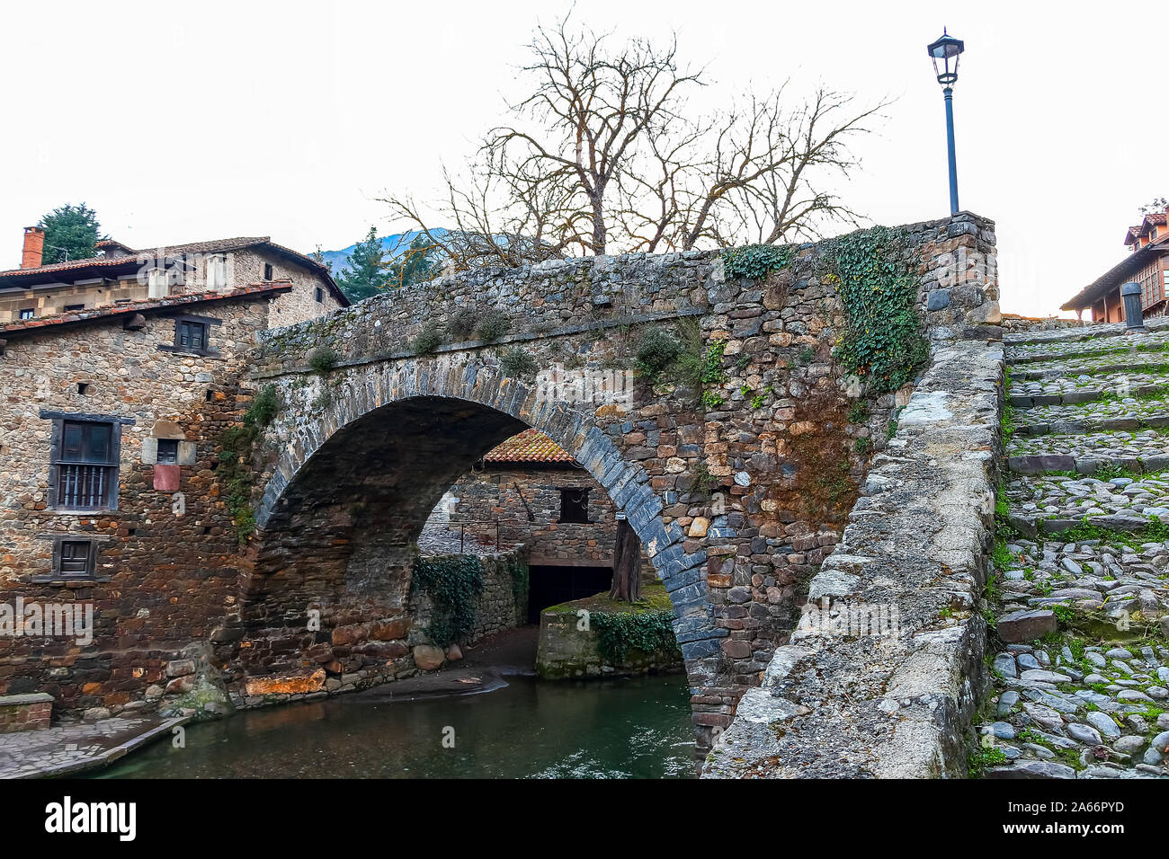 Old bridge in Potes, a municipality in the autonomous community of Cantabria in Spain Stock Photo