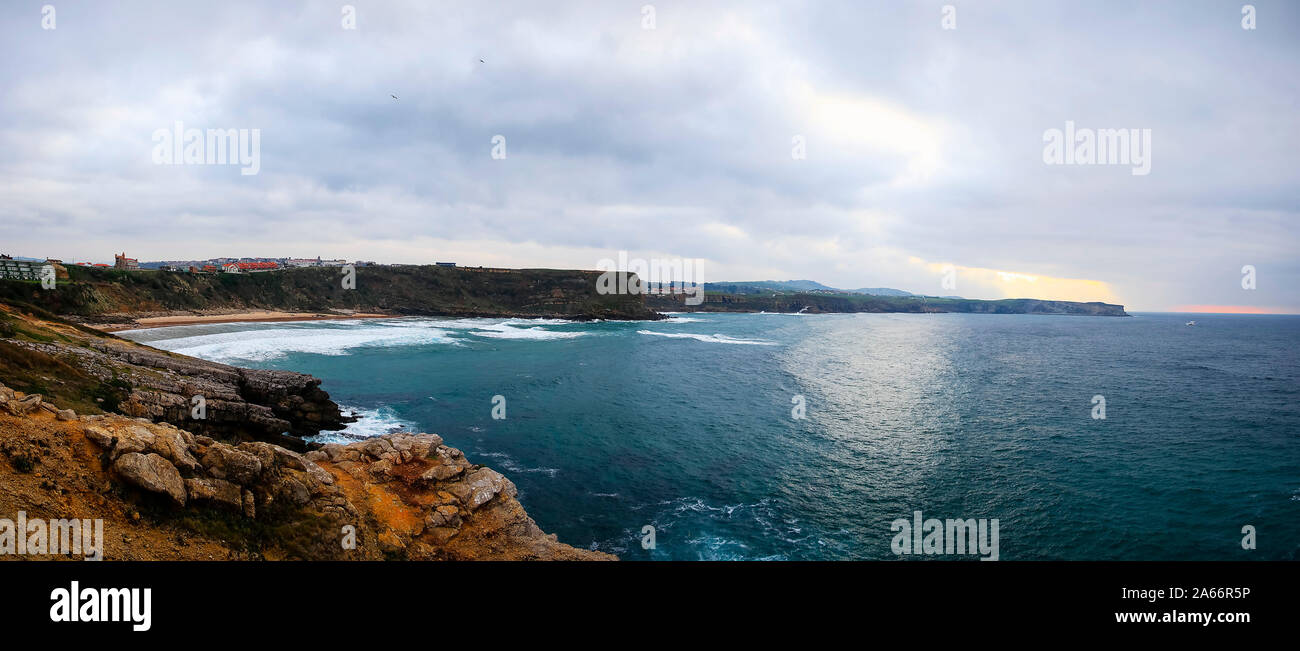 Panoramic view of Suances cliffs at sunset. Cantabria, Spain Stock Photo