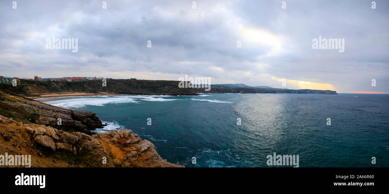 Panoramic view of Suances cliffs at sunset. Cantabria, Spain Stock Photo