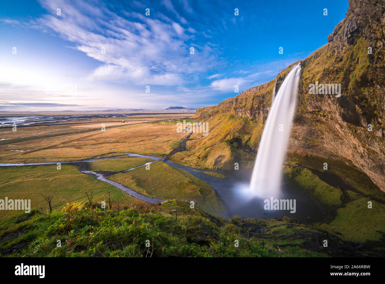 Scenic view of Seljalandsfoss waterfall from hill, South Iceland, Iceland Stock Photo