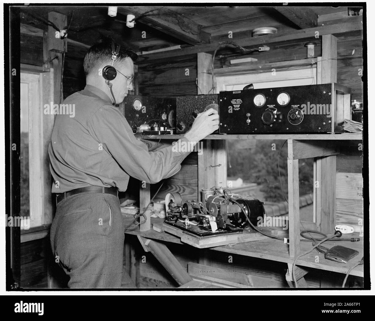 Weather signals recorded. add weather device. Washington, D.C., Sept. 13. By means of this chronograph, Dr. L.V. Astin records the weather signals sent down from the radiometeorograph attached to the balloon as it soars anywhere from 9 to 11 miles in the upper air. 9/13/37 Stock Photo