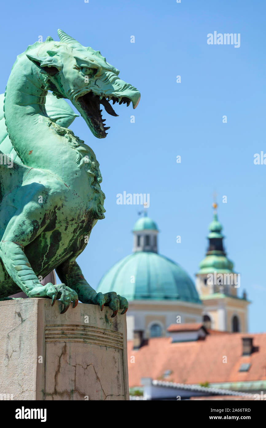 Ljubljana Dragon Bridge dragon statue on the Dragon bridge Zmajski most in front of the Ljubljana Cathedral Ljubljana Slovenia Eu Europe Stock Photo