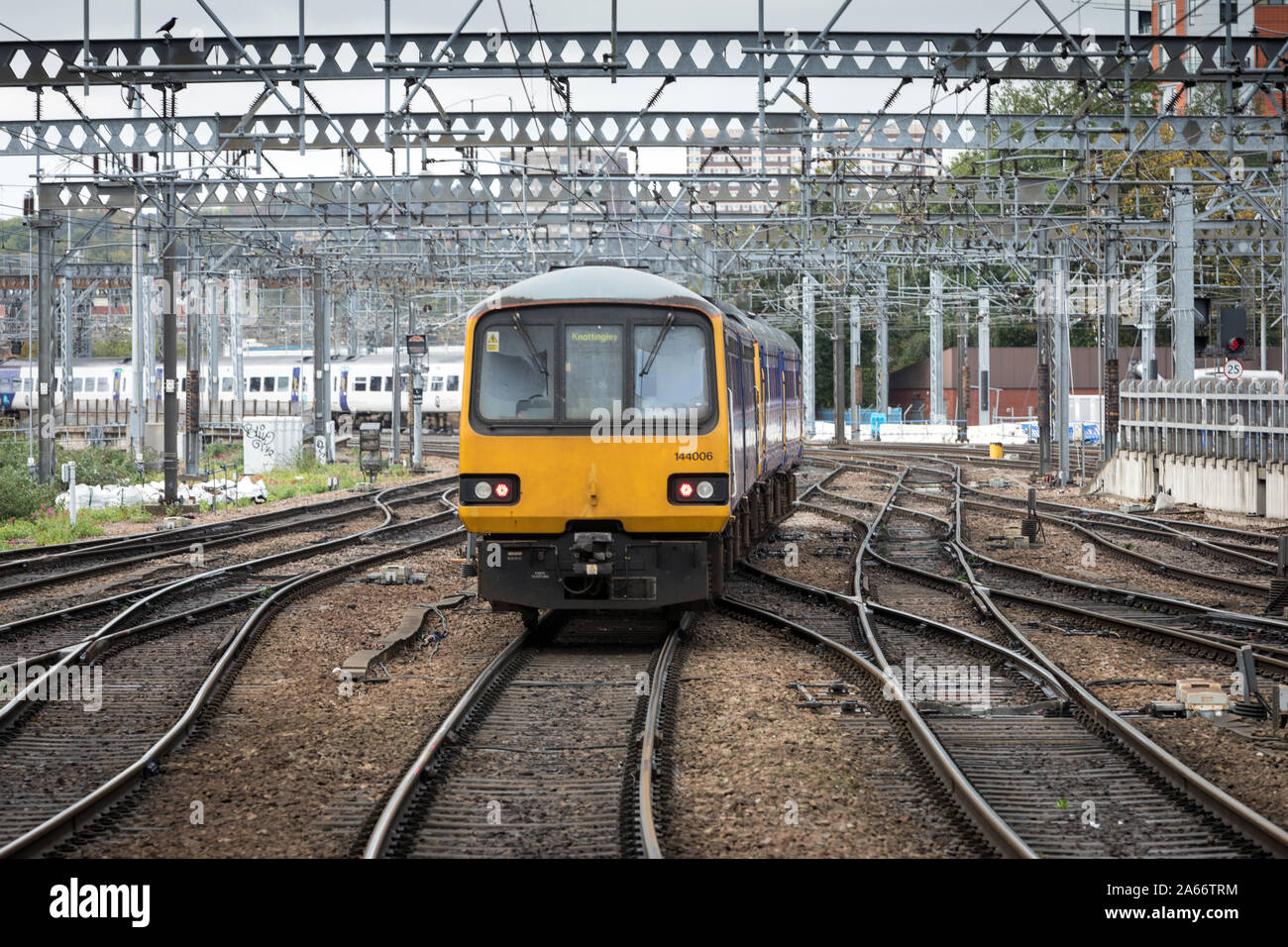 A Northern Rail train made up of ageing Pacer units leaves Leeds station heading for Knottingley in West Yorkshire Stock Photo